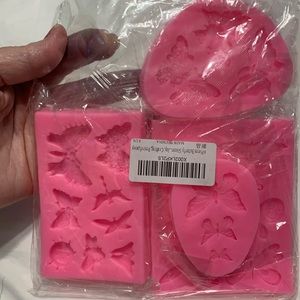 Resin molds that can be used as candy molds, all new, never used. cute designs